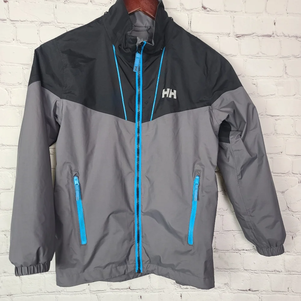 Helly Hansen Lightweight Kids Windbreaker Regular 140/10. Black,Gray and…